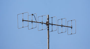 A typical VHF Cubical Quad Antenna showing the reflector (most left hand), driven element (second in from left) and four directors