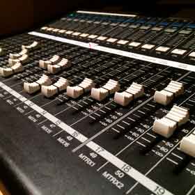 Audio mixer controls use slider potentiometers