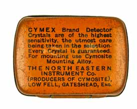 Image of the advertising words used on the back of a tin used when selling crystals  for crystal radio sets | www.electronics-radio.com