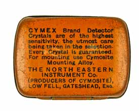 Image of the advertising words used on the back of a tin used when selling crystals for crystal radio sets | www.electronics-radio.com