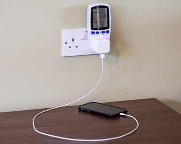 Electrical power meter measuring smartphone charging power