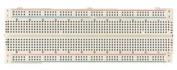 An example of a solderless stripboard where components are slotted into the holes to make connections