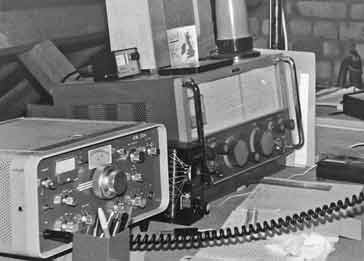 KW204 HF SSB / CW amateur radio communications transmitter in a radio station with an Eddystone EA12.