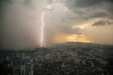 Lightning strike represents a large discharge between areas of positive and negative charge where a very high electric field gradient is present