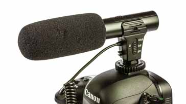 A shotgun microphone on a camera ready for video making