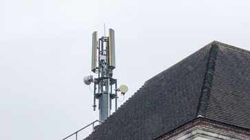 Typical mobile communications tower mounted on a building