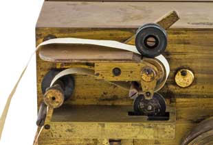 Paper feed mechanism on a Morse telegraph inker