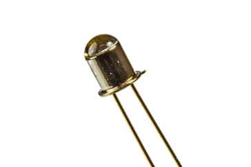 A typical phototransistor semiconductor device with lens to focus the light on the transistor - it only has two leads as the base connection is often left open circuit and no external connection provided.