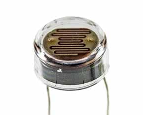 Image of a typical leaded light dependent resistor, LDR or photoresistor showing the resistive element - surface mount technology, SMT LDRs are also available