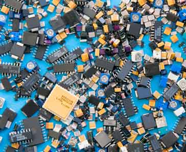 Selection of a variety of surface mount technology devices: surface mount resistors, surface mount capacitors through to surface mount ICs