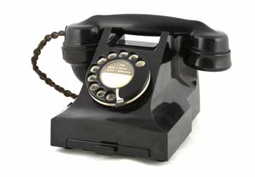 Carbon microphones were used in telephones like this vintage British GPO 300 series telephone