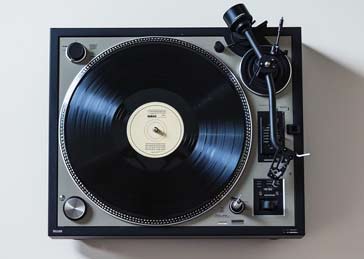 Example of a typical vinyl record player turntable - ai generated used until real ones come