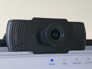 Webcam mounted on top of a computer monitor